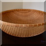 D54. Woven basket. 6”h x 17”w - $18 